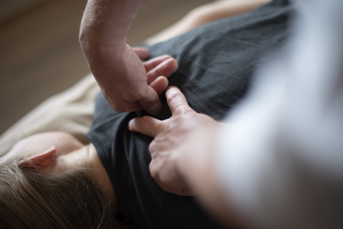 Close-up of hands-on treatment